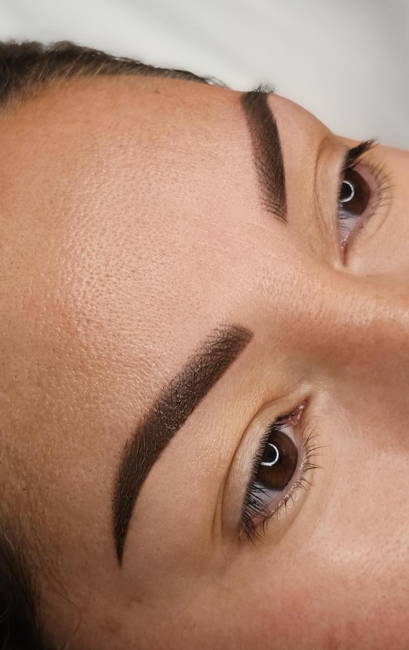 Powder brows with a sculpted arch by Brenda Cazares, permanent makeup artist at The Beauty Plug in National City.